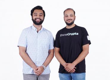 TransCrypts co-founders Ali Zaheer and Zain Zaidi standing and smiling